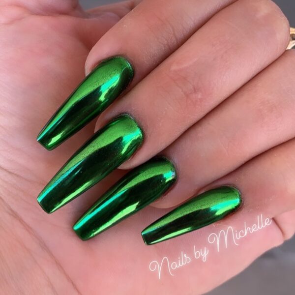 St. Patrick's Day nail inspo in green chrome on coffin tips