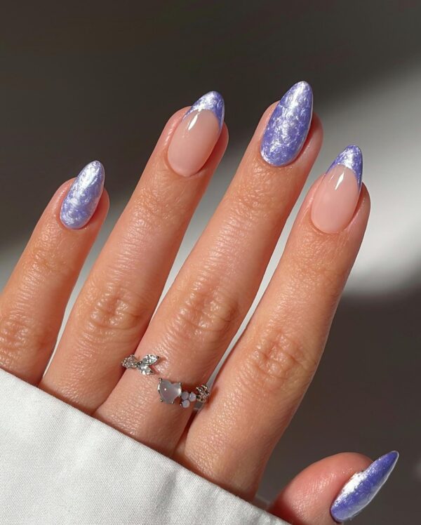 Purple metallic pastel nails with shimmer effect for spring 2025 nail inspo