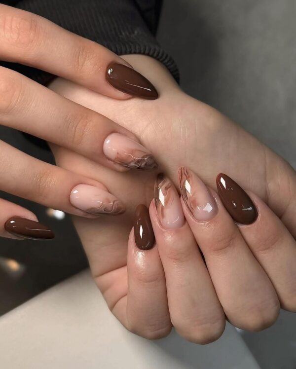 Medium almond nails in chocolate and brown marble effect for the fall