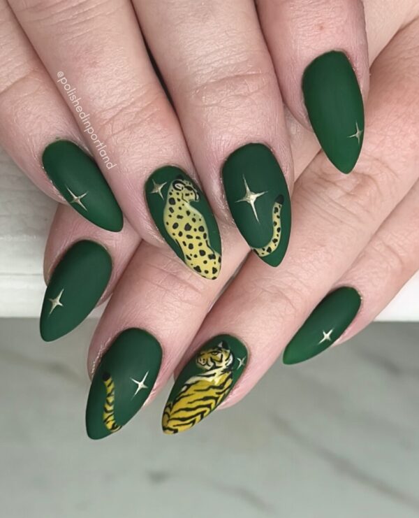 Dark green nails with tigers